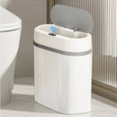 Smart sensor trash can with automatic lid in modern bathroom setting