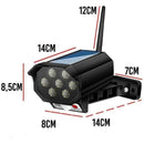 Solar-powered outdoor security camera with LED lights and antenna, product dimensions labeled.